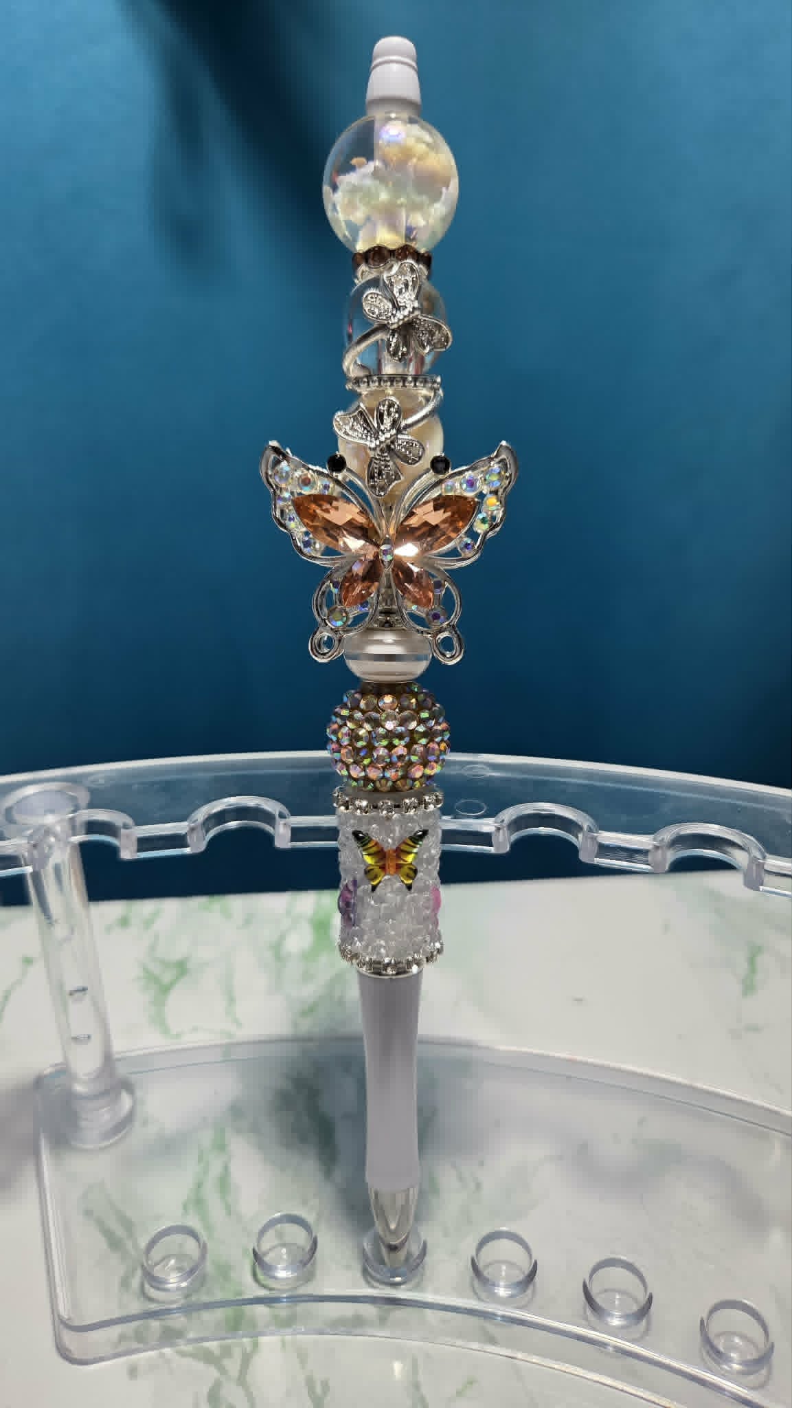 Butterfly Folly White Beadable Pen with peach crystal butterfly charm and silver accent beads