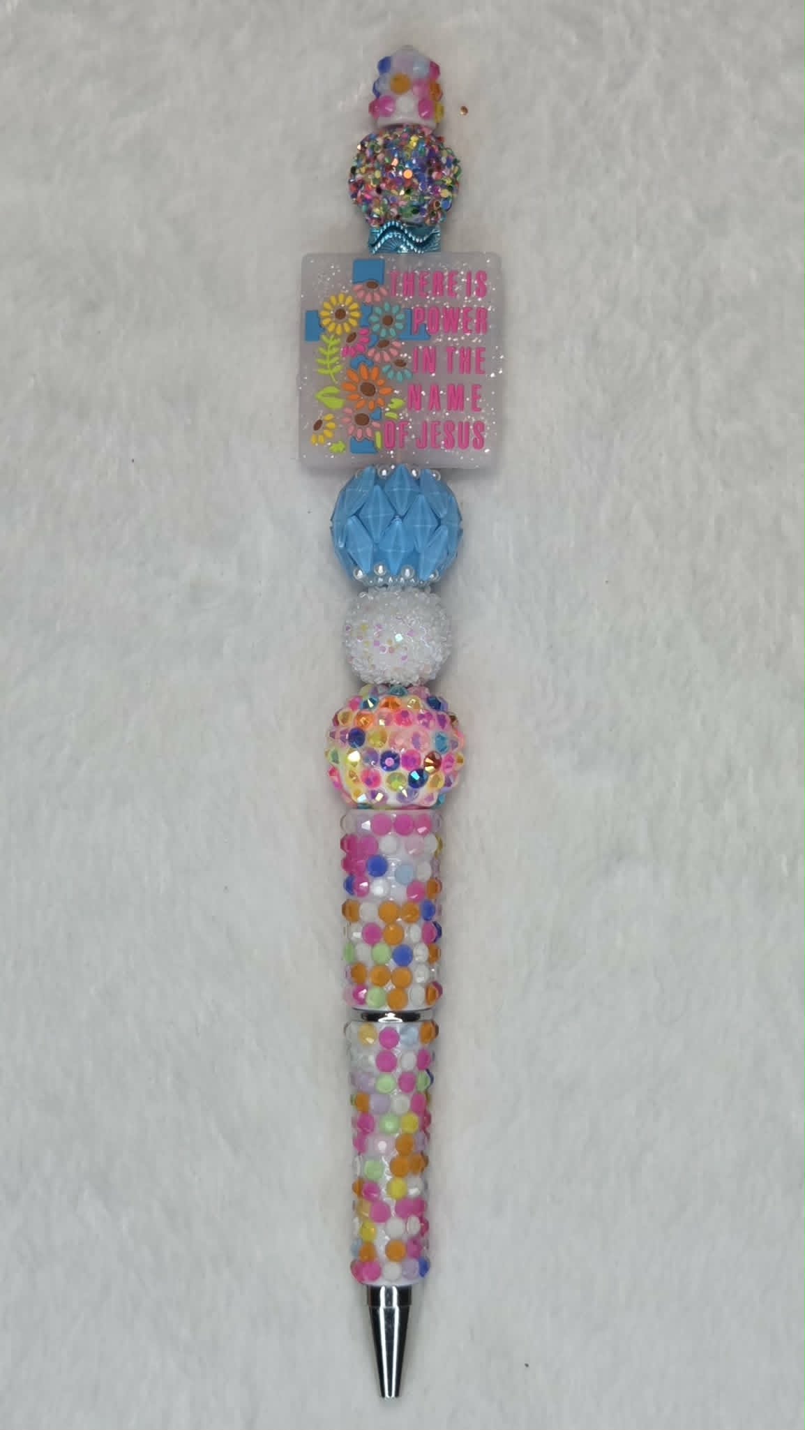 Explosive Blue Beadable Pen with rainbow confetti barrel and sky blue crystal bead