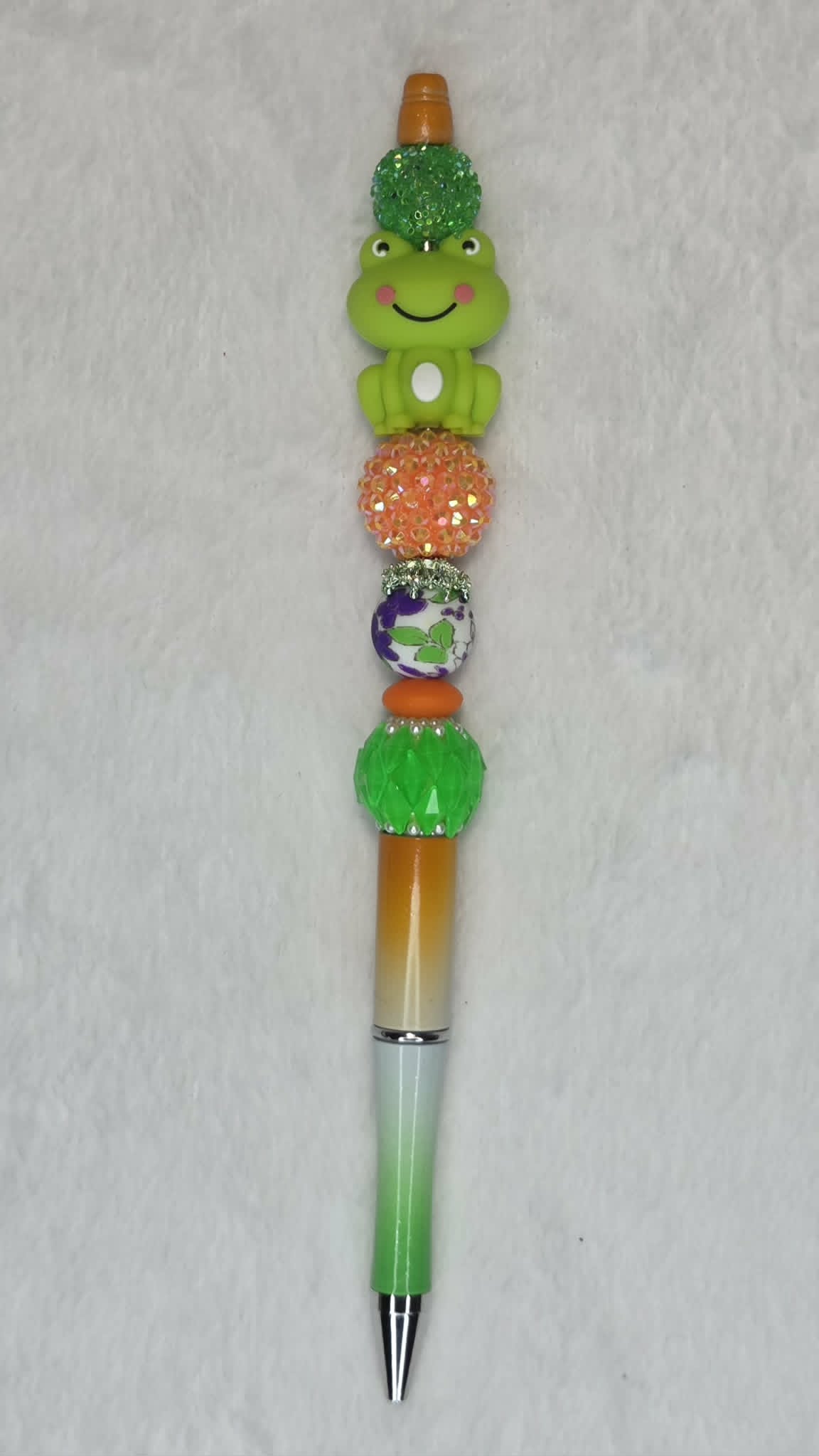 Green Glow Happy Frog Beadable Pen with smiling frog focal and orange to green ombre barrel