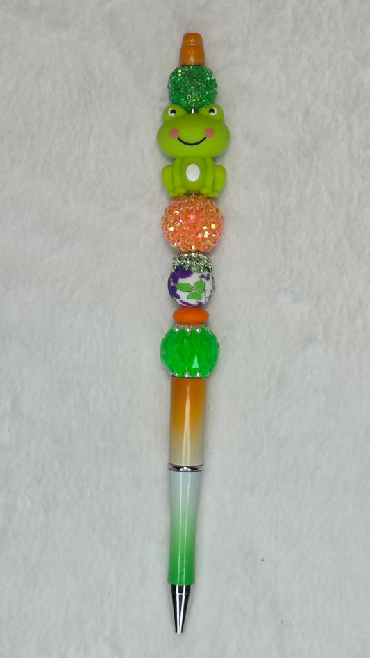 Green Glow Happy Frog Beadable Pen with smiling frog focal and orange to green ombre barrel