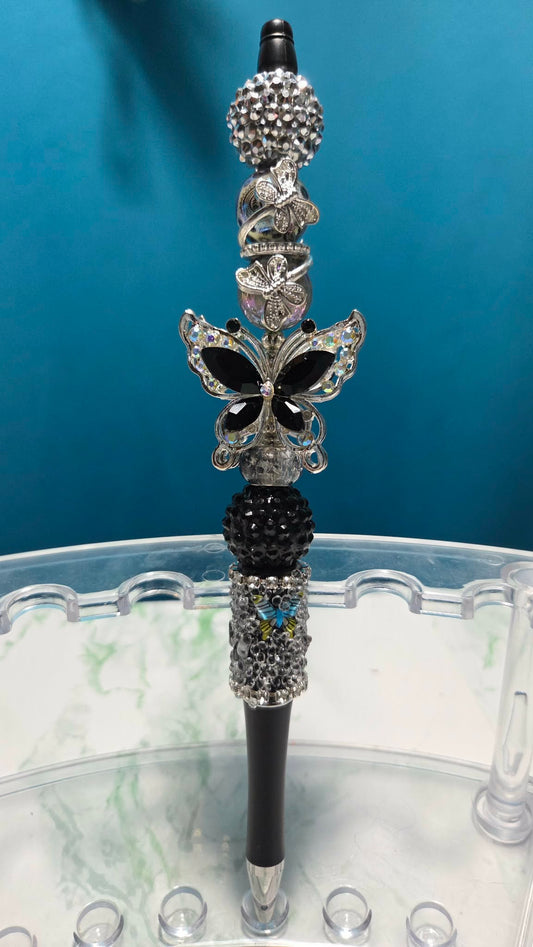 Butterfly Folly Black Beadable Pen with jet black crystal butterfly charm and silver accent beads