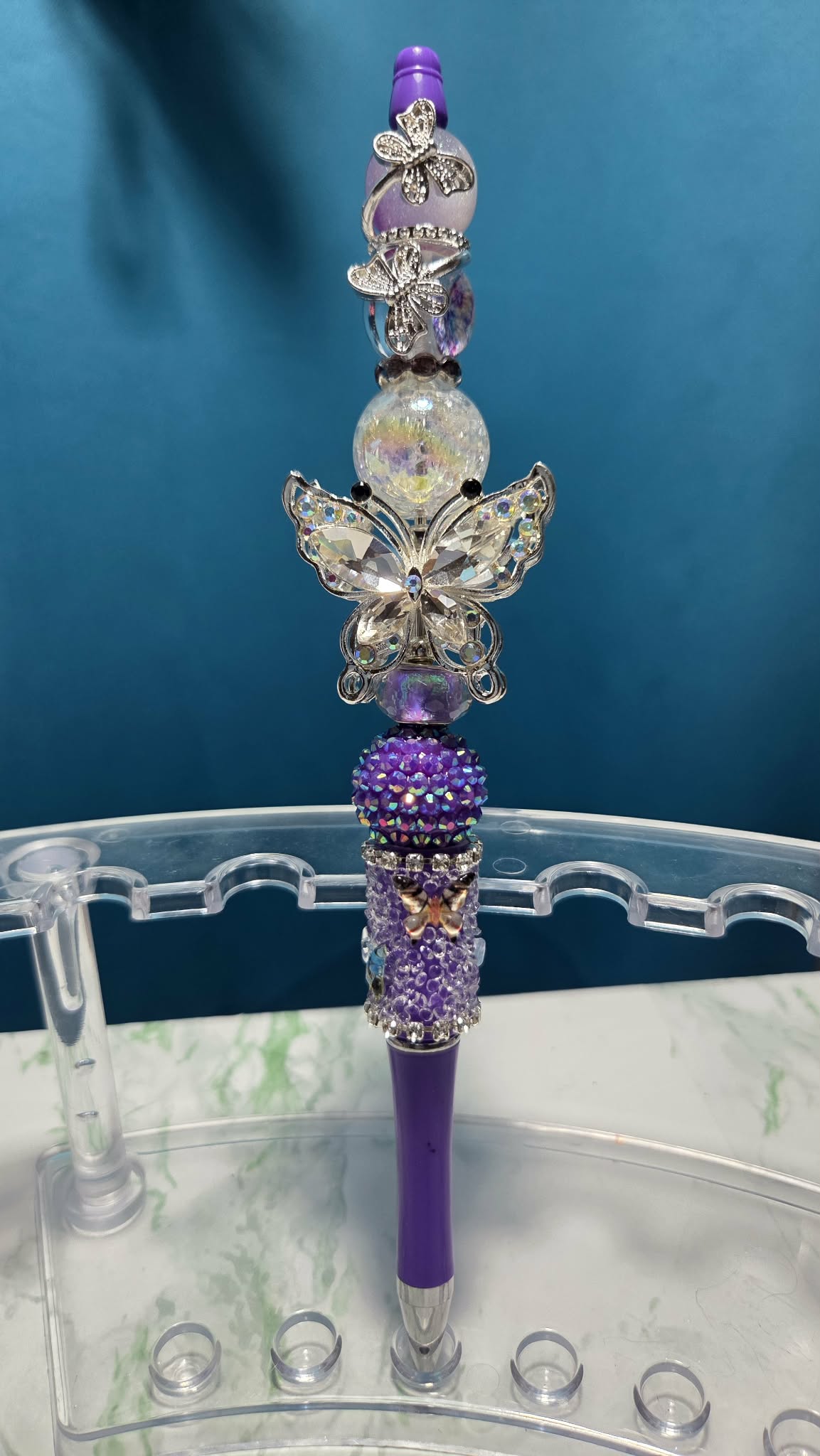 Butterfly Folly Purple Beadable Pen with iridescent crystal butterfly charm and purple rhinestone beads