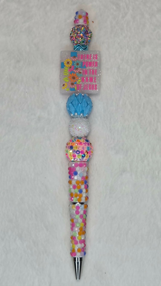 Explosive Blue Beadable Pen with rainbow confetti barrel and sky blue crystal bead