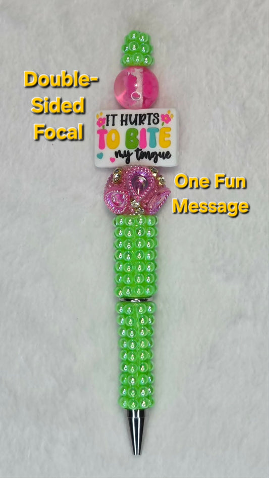 Bite My Tongue Beadable Pen showing It Hurts to Bite My Tongue focal side with neon green barrel