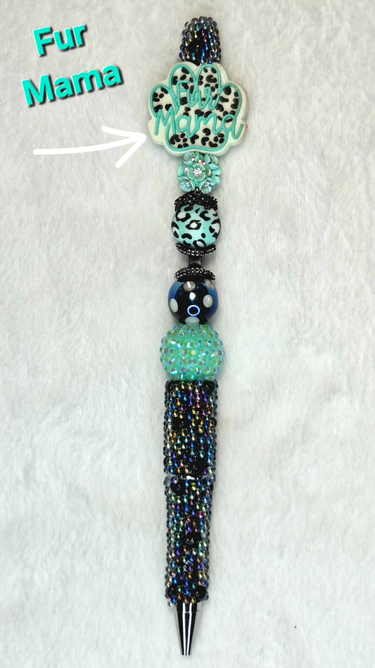 Electric Blue Fur Mama Beadable Pen with leopard paw focal bead and iridescent black crystal barrel
